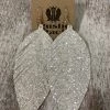 Golden Stella Glitter Leather Feather Earrings In White ACCESSORIES