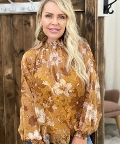 The Rustic Rack Boutique Smocked Neck Floral Top